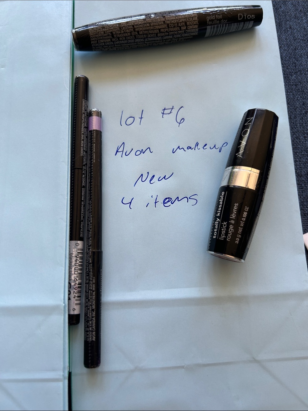 # 6 Avon Lipstick and Eye Pencils in Black and Purple